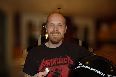A picture of me with the Metallica inflatable ball and a guitar pick