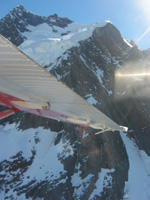 Vy över Southern Alps från flygplanet